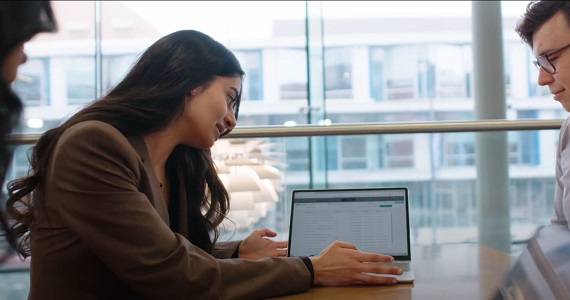 Arya Amaro looks at data on a laptop